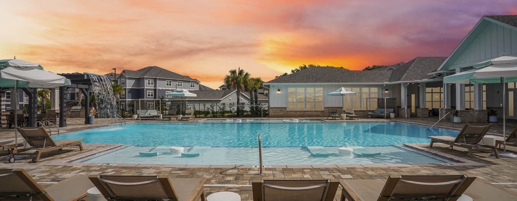 a pool with loungers
